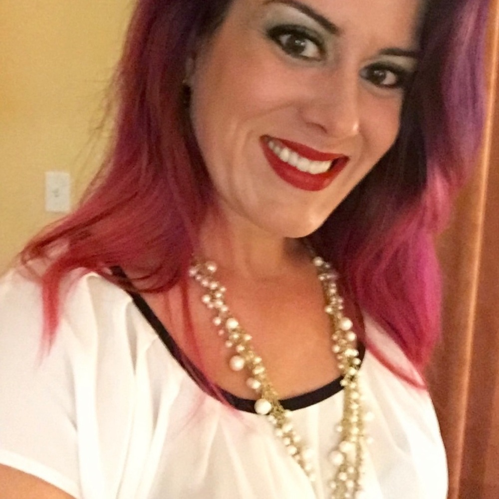 LC cream colored blouse with black trim